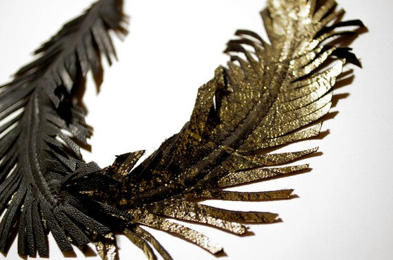 gold_and_black_feather_detail_fc998290-1919-4ed6-9868-c333e077d8ed.jpeg