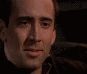 Nicolas-Cage-Trying-to-hold-in-laughter.gif