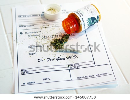 stock-photo-medical-marijuana-prescription-with-a-bud-some-shake-and-a-joint-on-a-prescription-with-a-146007758.jpg