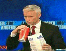 Anderson-Cooper-Popcorn-Gif-While-Live-On-CNN.gif