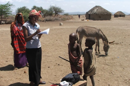 researcher_gathering_data_in_field_in_afric_450.jpg